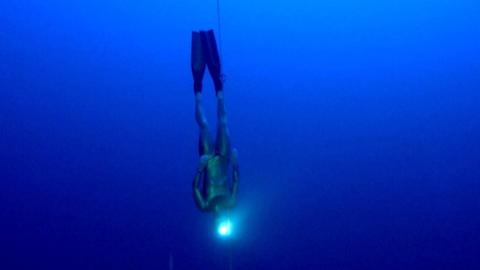 Russian freediver Alexey Molchanov plunges below the Mediterranean Sea in Limassol, Cyprus.