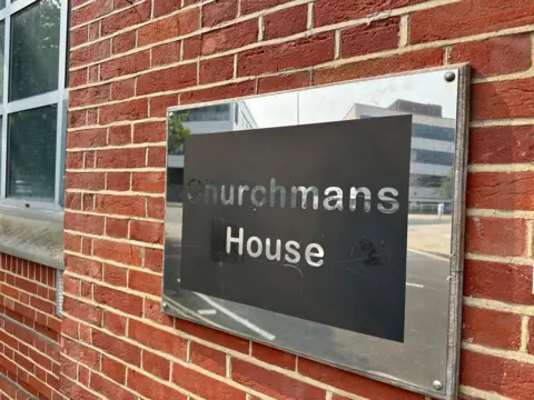 Ben Parker/BBC Sign for Churchmans House