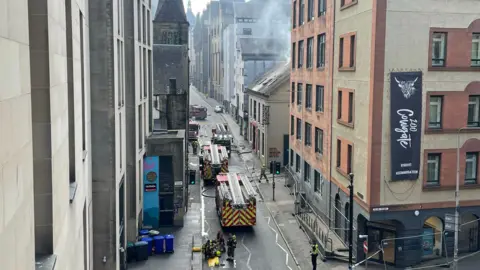 Firefighters extinguishing a fire in Edinburgh.