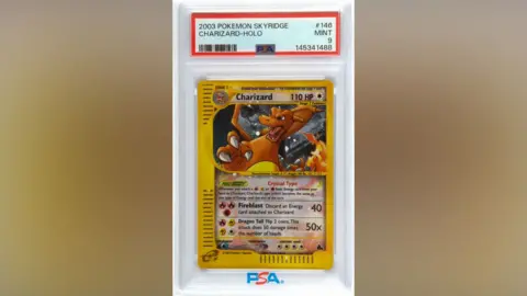 Ewbank’s Auctioneers/Bav Media A mint condition Pokemon Skyridge Charizard Holo
