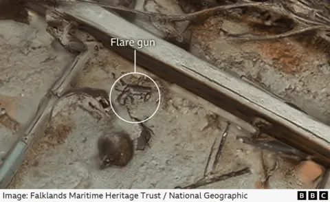 Falklands Maritime Heritage Trust / National Geographic A flare gun lies among the wreckage. It is labelled to help it stand out.