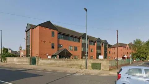 Google An image showing some brick office buildings in Derby.