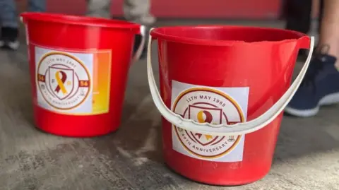 Collection buckets for 40th anniversary of Bradford stadium fire