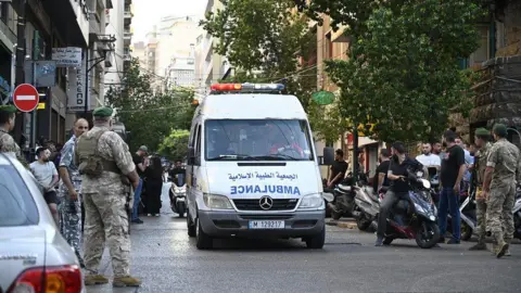 Getty Images An ambulance heading towards area of the blasts