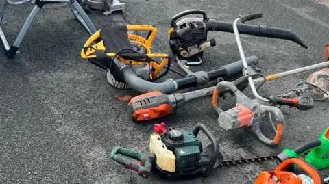 TVP Rural Crime Taskforce A few of the recovered stolen power tools laid on the ground.