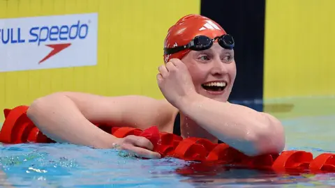 Rebecca Redfern celebrates victory at the British Swimming Championships in 2025