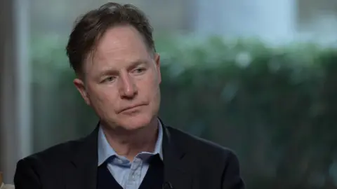 BBC Sir Nick Clegg in a recent BBC interview.  He is listening with a thoughtful expression to questions about student loans in England.  