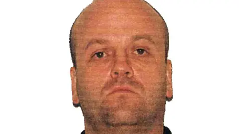 A custody shot of Allan Grimson. 