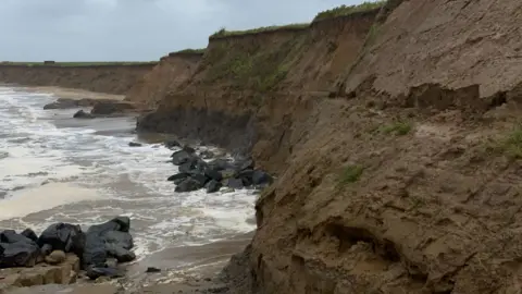 Robby West/BBC Cliffs at Happisburgh