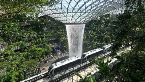 Getty Images A rain vortex at Singapore's Changi Airport