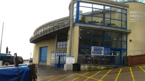 Chris Holifield/Geograph Front view of the Rocket House in Cromer, showing a glass-fronted building on a grey overcast day