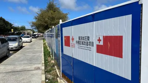 A sign outside the royal tomb informing that renovation work is underway with the help of Chinese aid.