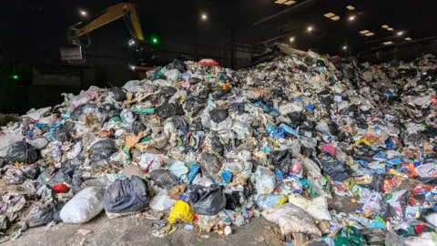 LDRS Piles of rubbish at Wrexham Industrial Estate recycling centre