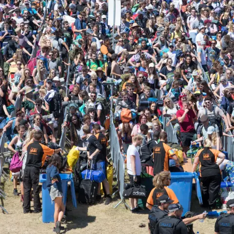 Matt Cardy/Getty Images Festival goers are searched as they arrive at Bestival, at Lulworth Castle near East Lulworth on August 2, 2018 in Dorset, England. 