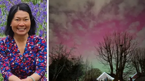 Yen Milne (left) is smiling at the camera is wearing a multi-coloured dress, has dark eyes and black hair. On the right is her picture of the northern lights