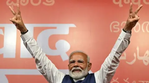 Narendra Modi speaks to supporters in Delhi - 4 June