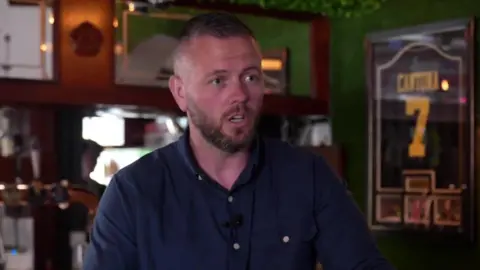 Robert Kenyon speaking to the BBC in a pub in the Makerfield seat