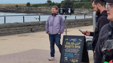 James Corden was seen directing the country   connected  Barry Island seafront