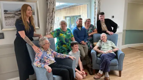 Jean and Terry with their family 