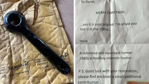 A composite of two pictures. On the left, a black metal tool with a long handle and a circular end. It is a locomotive's smokebox door handle. On the right is the typed letter from an anonymous person. It reads: "Merry Christmas. Yes it is your original, I'm afraid you lost it in the 1980s...
From a reformed and repentant former 1980s schoolboy souvenir hunter. 
P.S. Good luck with your restoration, please find enclosed a small additional contribution."