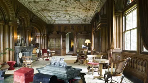 Andreas von Einsiedel | National Trust The library at Penrhyn Castle has remained unchanged for years with its opulent period furniture