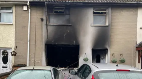 A house that has been damaged by a fire.