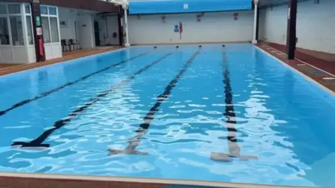 A lido, with walls on all sides, and five swimming lanes.