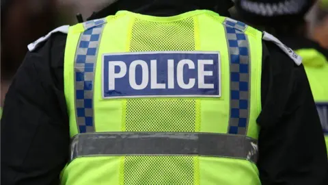 PA Media Police hi-vis