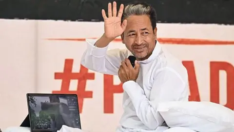 Sonam Wangchuk, Climate activist seen sitting on hunger strike at Jantar Mantar, on July 6, 2026 in New Delhi, India. The ongoing demonstration is demanding accountability over alleged irregularities in national examinations and the resignation of Union Education Minister Dharmendra Pradhan. (Photo by Sanchit Khanna/Hindustan Times via Getty Images)
