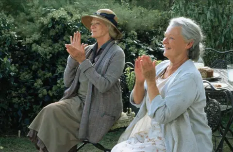 Alamy Dame Maggie Smith and Dame Judy Dench in Ladies in Lavender, 2004