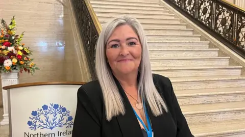 Mechelle Dillon, secretary of the group Birth Mothers and their Children for Justice, pictured in the Great Hall at Parliament Buildings, Stormont