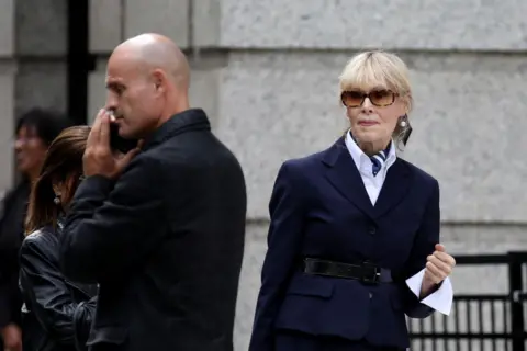 Getty Images E Jean Carroll appears outside of a New York courtroom on Friday 6 September