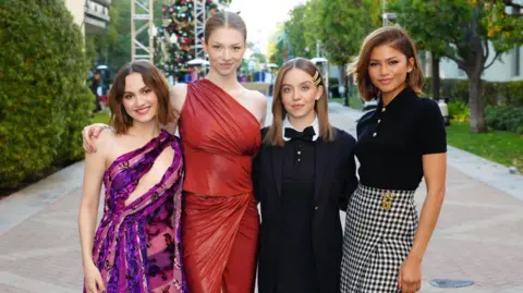 Getty Images Maude Apatow, Hunter Schafer, Sydney Sweeney, and Zendaya attend Euphoria FYC at Paramount Theatre on December 18, 2022 in Los Angeles, California