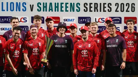 The players of England Lions celebrate winning the T20 series against Pakistan Shaheens