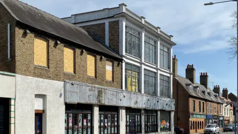 Connor McNeill A general view of the building, showing that it is on a busy King's Lynn street.