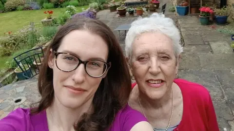 Caroline Bentham A selfie of Caroline Bentham and her mum Mary in a garden. 