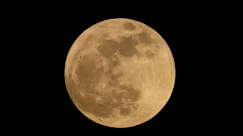 Getty Images The moon rises in Caracas, Venezuela 