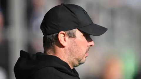 Barrow head coach Stephen Clemence watching his team in action during a match in October