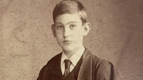 Courtesy Sotheby’s Photograph of the Cheshire mountaineer George Mallory. The black and white image shows him as a schoolboy in his uniform.