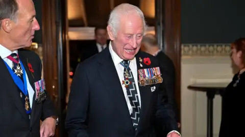 PA King Charles, wearing a poppy and several military medals, is seen at the Remebrance event at the Royal Albert Hall in London on 9 November