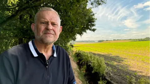 Russell Lowbridge at the site where his grandfather's remains were found