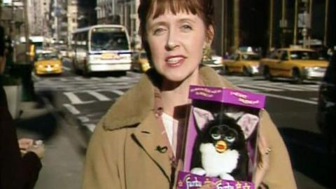 Rosie Millard with a Furby