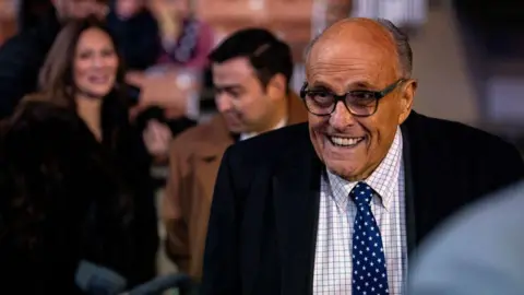 Getty Images Rudy Giuliani smiles