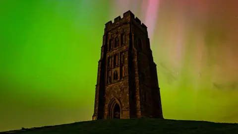 Michelle Cowbourne Glastonbury Tor under the Northern Lights 