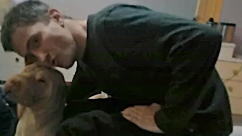 Family Handout A man and a dog