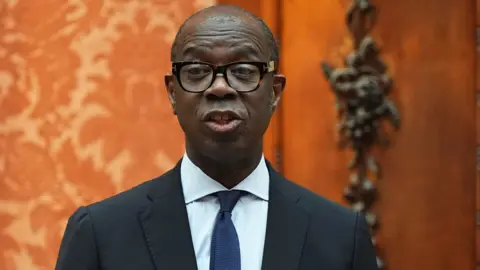 PA Media Clive Myrie speaking during a reception for winners of the Queen's Commonwealth Essay Competition, at Buckingham Palace in London last month.