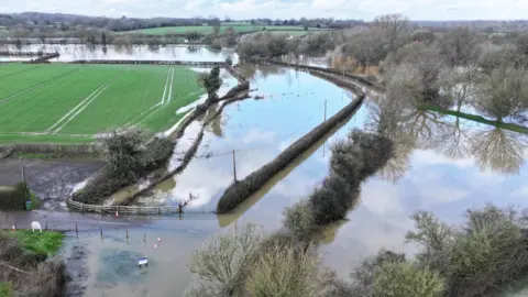 Eddie Mitchell An aerial shot of flooding across several fields.
