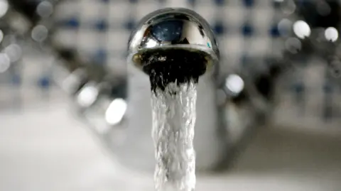 PA Stock picture of water coming out of a tap
