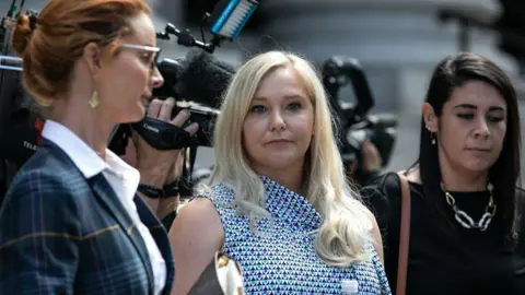 Getty Images Virginia Giuffre standing outside court 