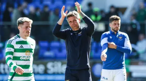 Simo Valakari applauds the home support after his St Johnstone side beat Celtic 1-0 at McDiarmid Park on 6 April